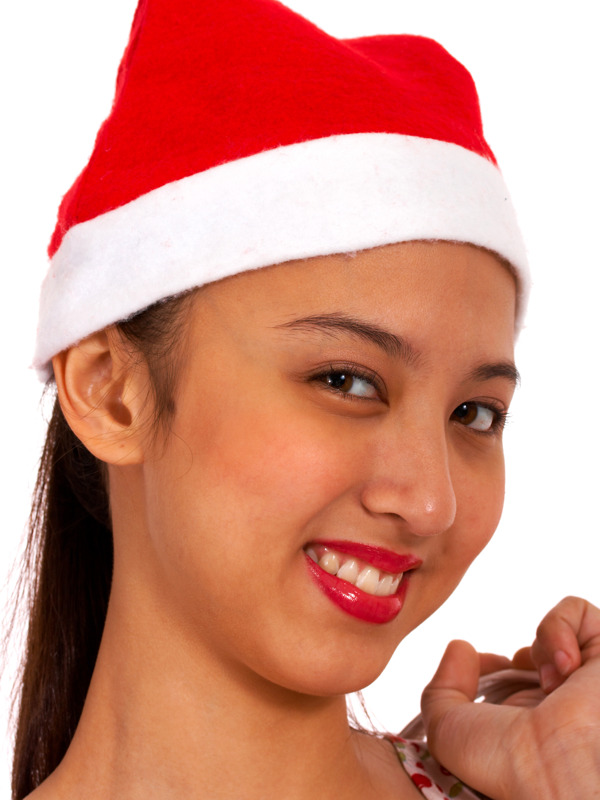 快乐的女孩戴着圣诞帽
