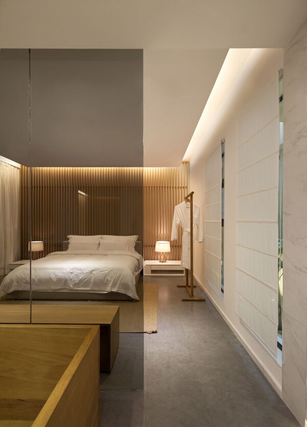 现代时尚卧室金褐色背景墙室内装修效果图