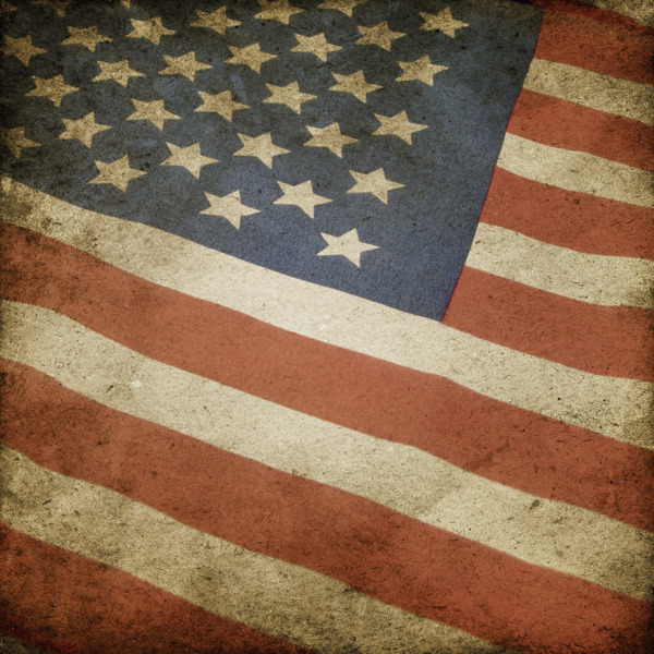划伤和破裂的蹩脚的美国国旗的纹理背景