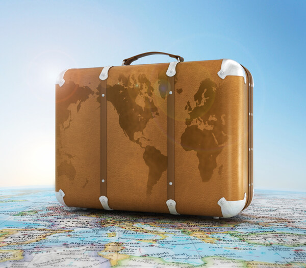 行李箱与世界地图图片