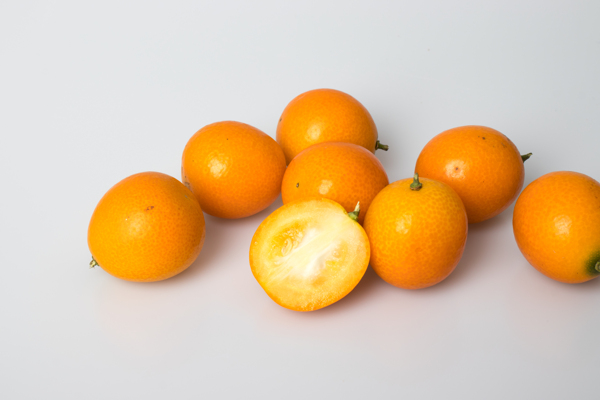 水果金桔金橘白底元素